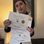 tesol graduate holding certificates