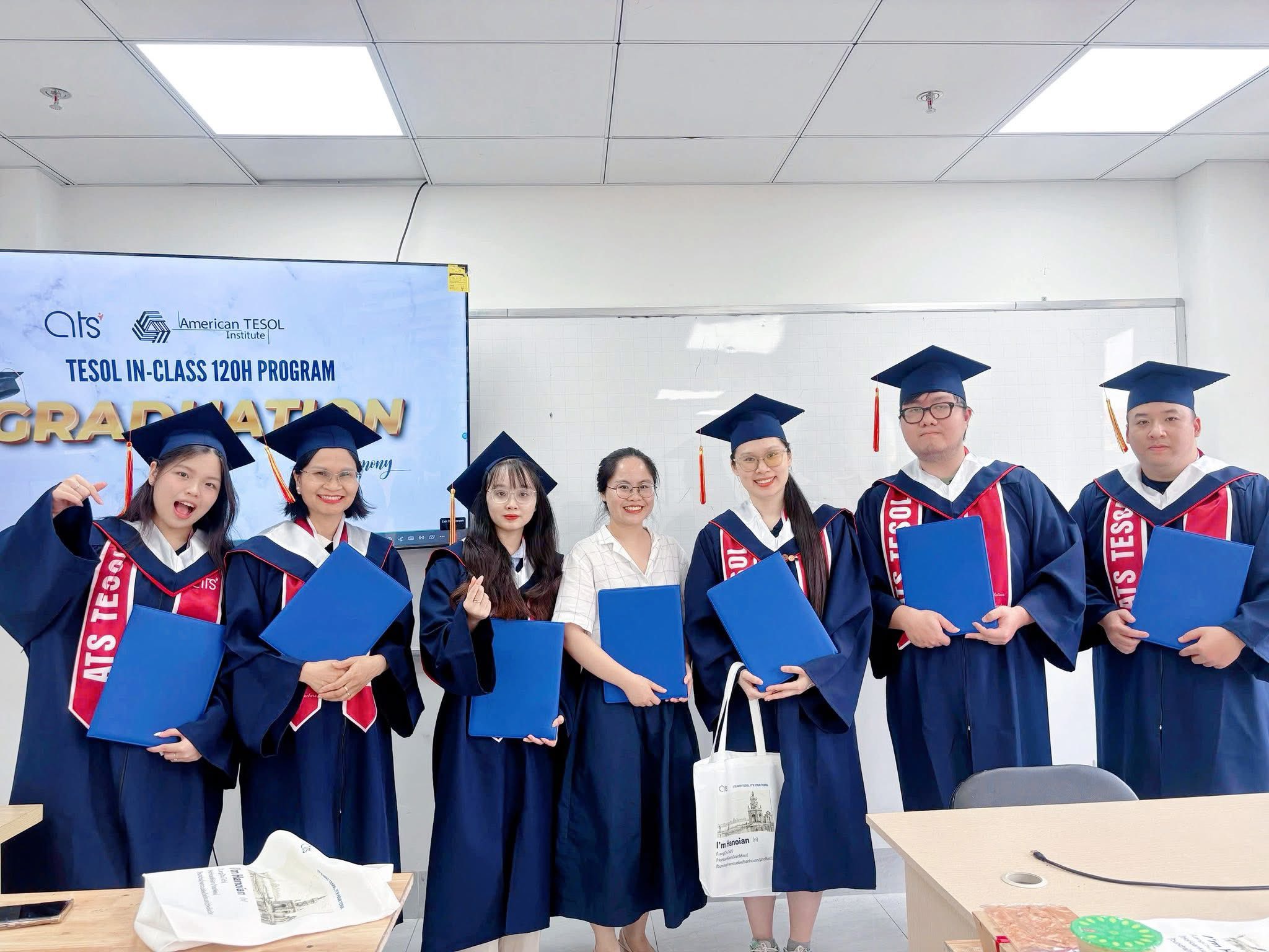 Teacher educating students while teaching English as a second language