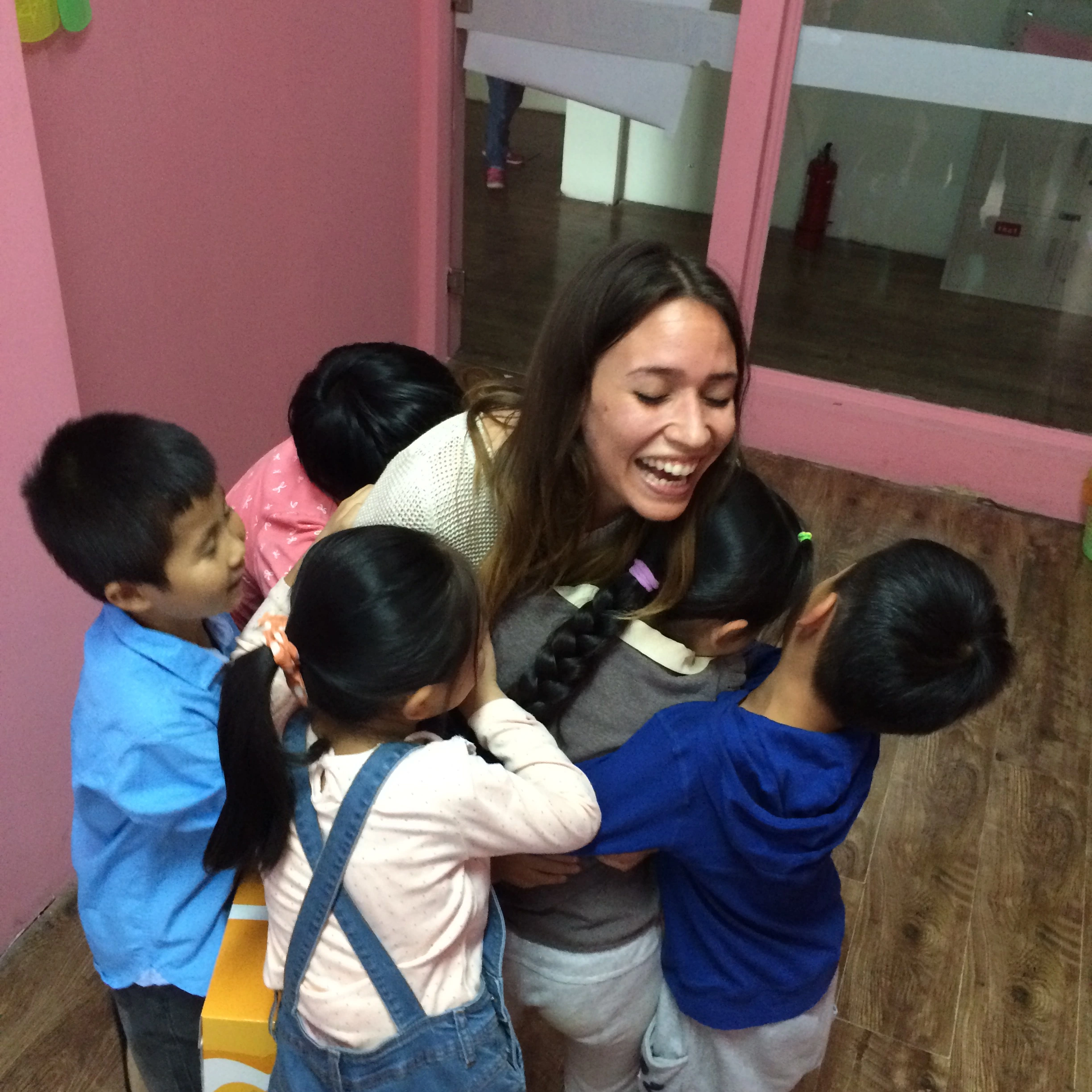 TESOL teacher working with English language learners